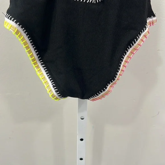 Platinum inspired by Solange Ferrarini Crochet Trim Swimsuit